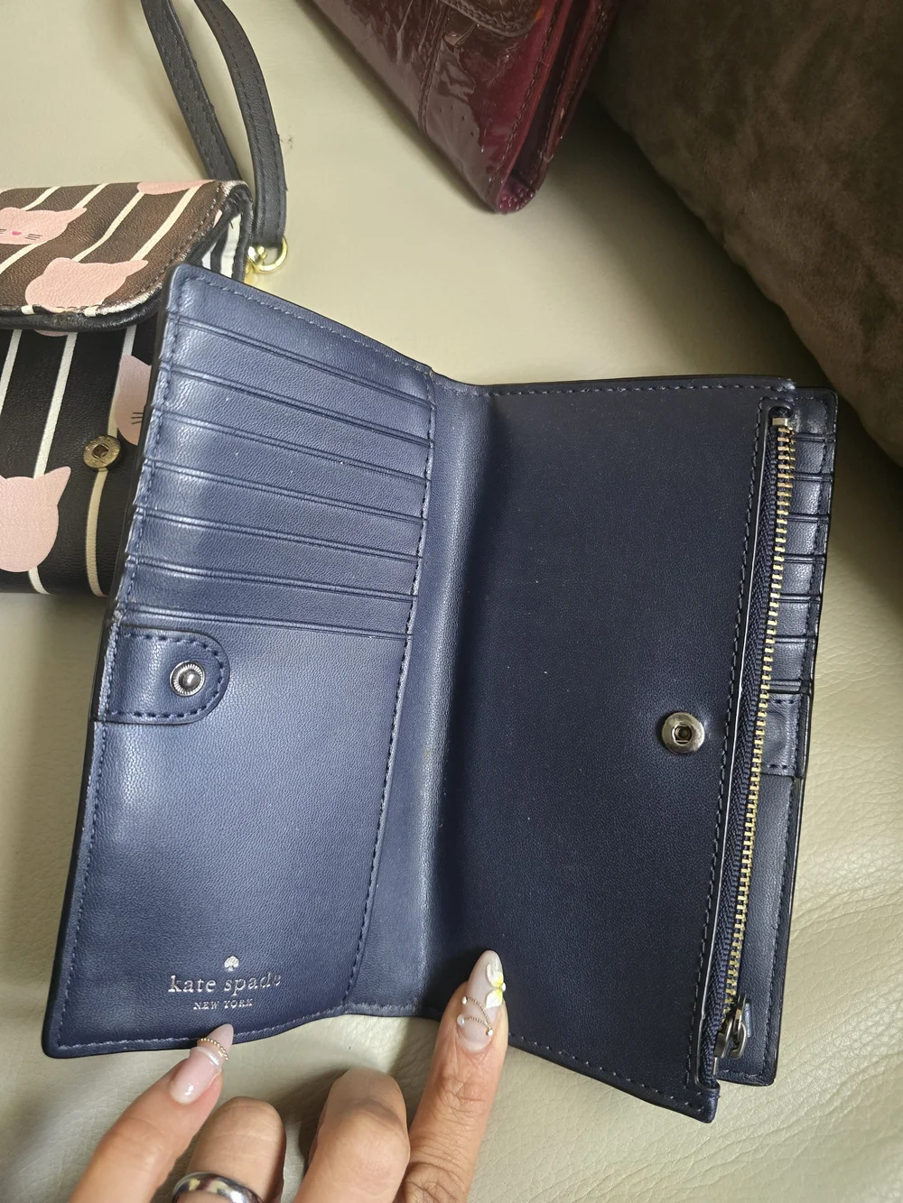 kate spade navy leather continental wallet with crown cutouts